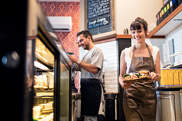 Cafe waiters behind a counter