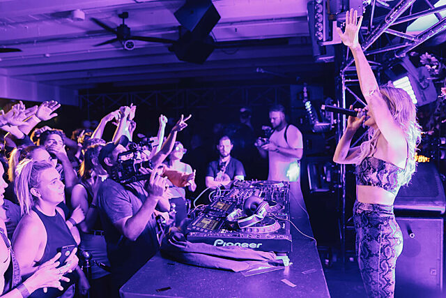Live rock band performing to a crowd