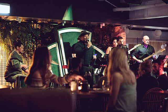 Musicians performing on an indoor stage