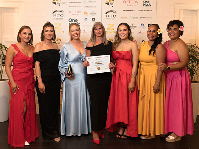 The FACE | Body & Beauty Balclutha team pose after winning the 2026 Beauty NZ Spa of the Year Award