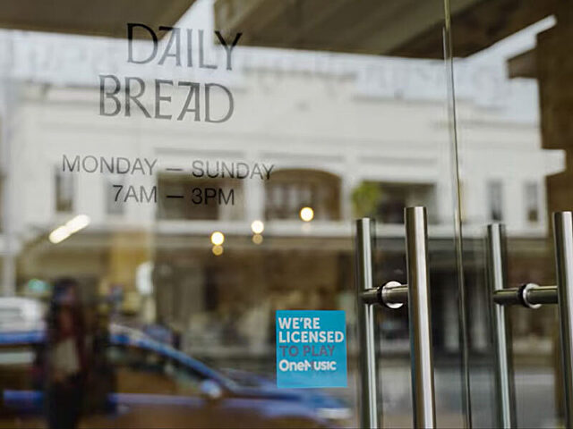 OneMusic sticker on the door to Daily Bread